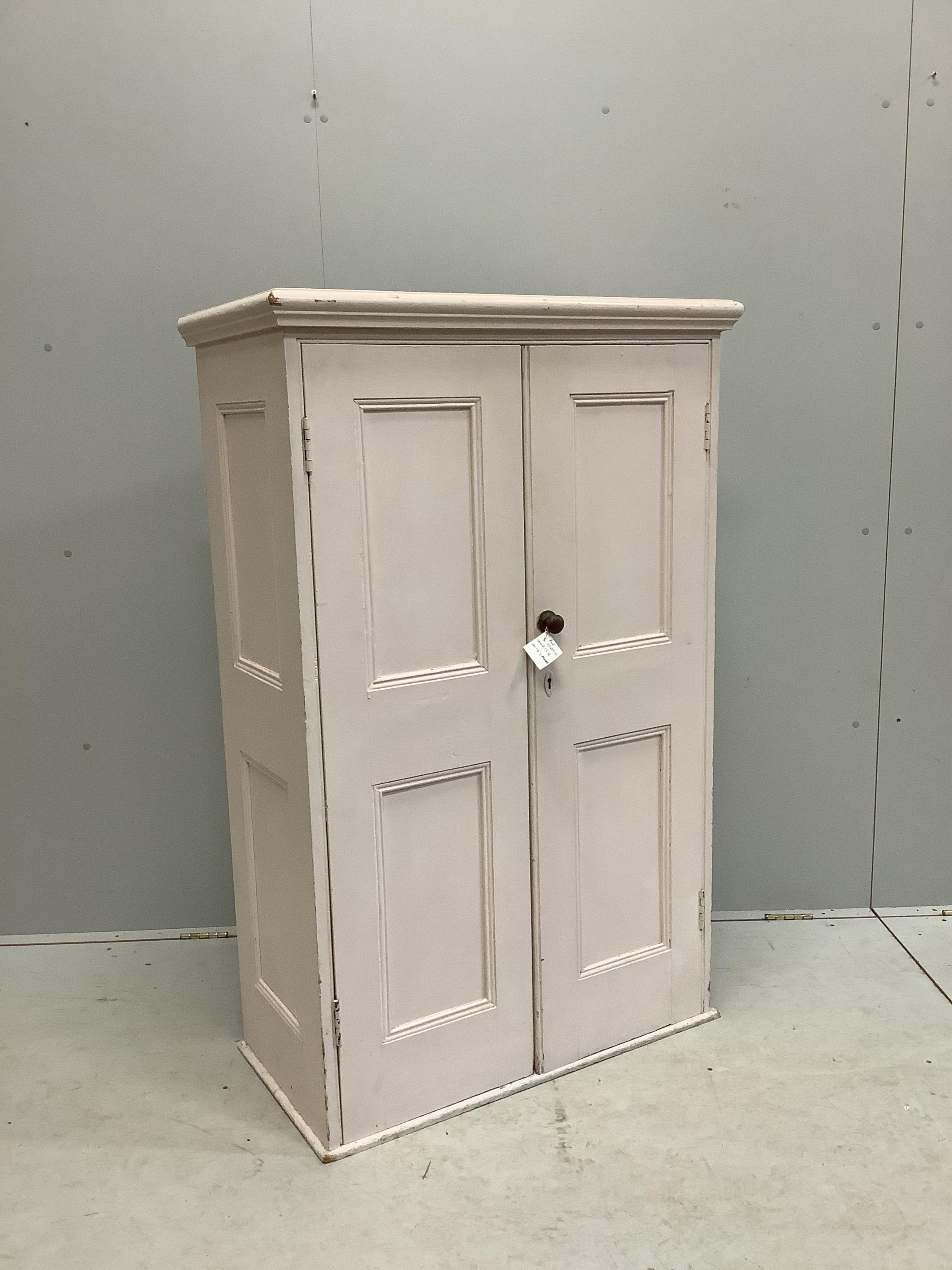 A Victorian painted pine panelled cupboard the interior with three shelves, width 86cm, depth 43cm, height 135cm. Condition - fair